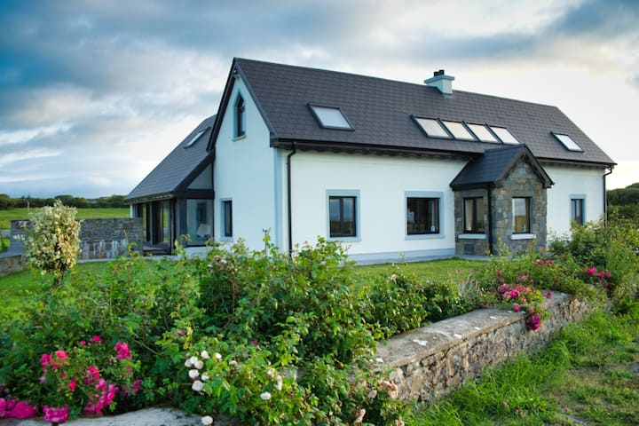 The Boathouse; Seafront Modern Home - Clare County