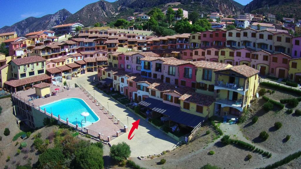 Villetta bordo piscina vista mare Wi-Fi Gratis - Iglesias