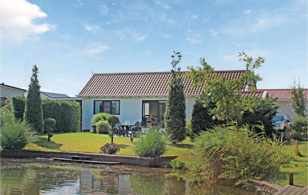 This Well Furnished Chalet In Zeeland Is Located Right On The Water, In A Beautiful Vacation Park In - Zeeland