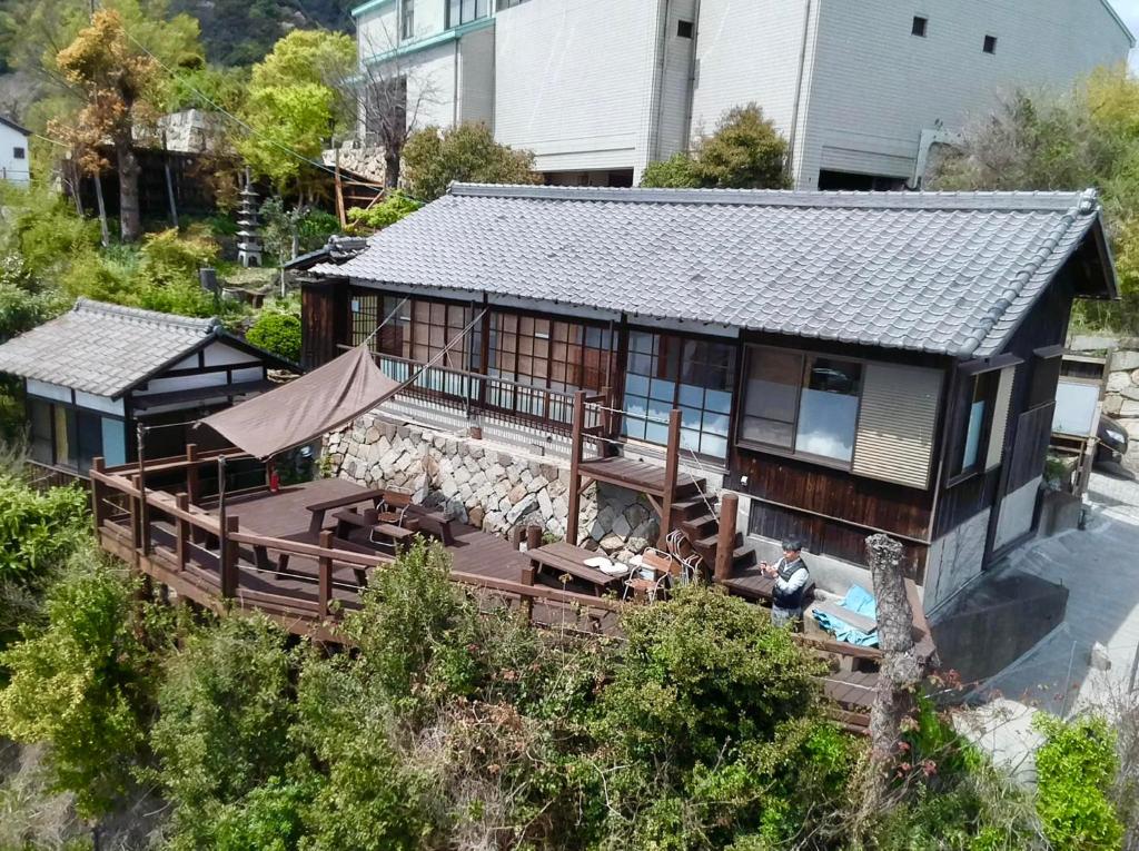城跡石垣上の絶景宿 鞆城茶屋庵 - Fukuyama