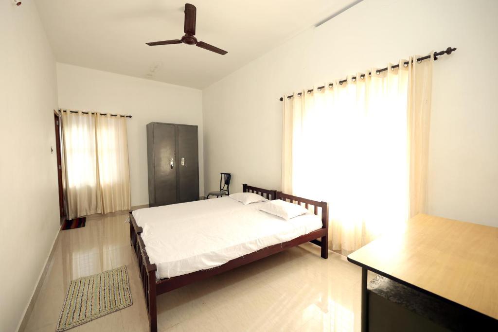 Daffodil Rooms - Non Ac - Thalassery