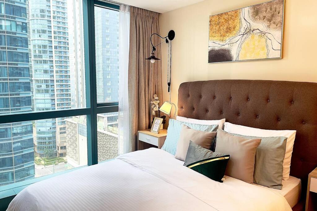 Angeliz Suites One Uptown Residence Bgc -1br, Fast Wifi, Free Swimming & Next To Shopping Malls - Estancia
