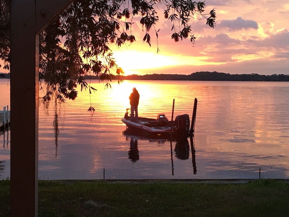 ターポン湖、魚、水泳、ジェットスキーなどの美しい夕日 - ホリデー, FL
