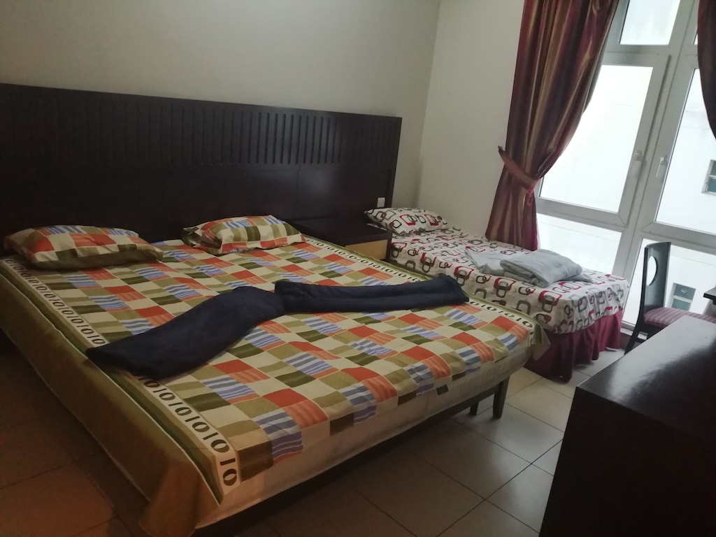 Furnished economical room with kitchen facilities laundry n free internet - Sharjah