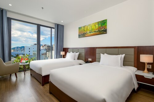 Aria grand hotel and apartments (salle familiale 1 avec balcon) - Đà Nẵng